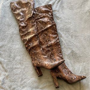 Thigh high brown snakeskin boots